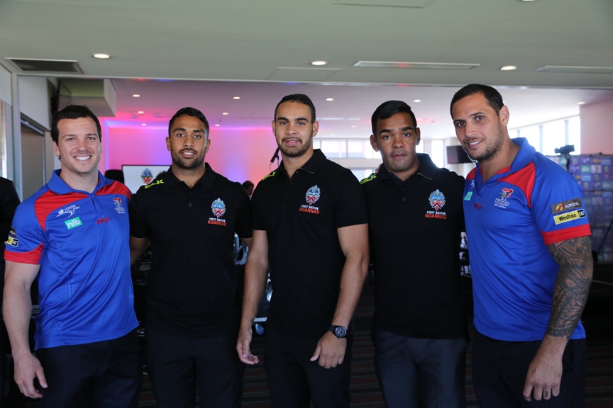 Newcastle Knights players Jarrod Mullen (left) and Jeremy Smith (right) with First Nation Goanna's.